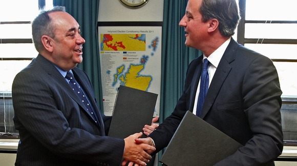 Scottish First Minister Alex Salmond shakes hands with Prime Minister David Cameron