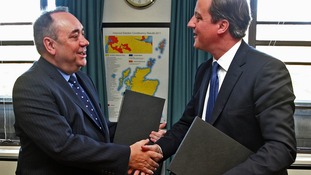 Scottish First Minister Alex Salmond shakes hands with Prime Minister David Cameron