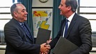 Scottish First Minister Alex Salmond shakes hands with Prime Minister David Cameron