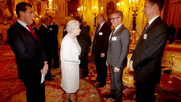 The Queen and Duke greet guests