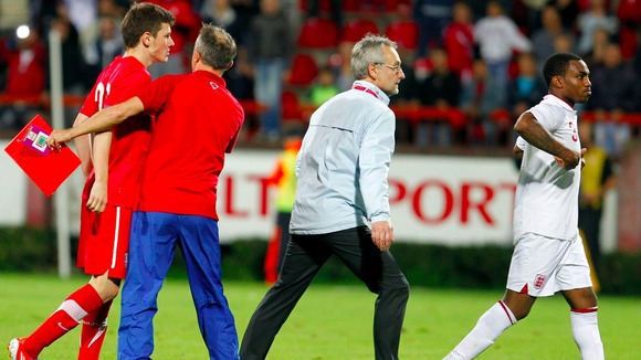 Serbian player Milos Ninkovic, left, and England player Danny Rose, right, react during their 2013 UEFA European Under-21 match.
