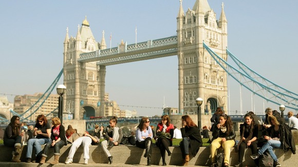 Office workers near Tower Bridge, in central London.