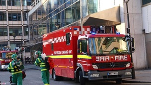 The fire brigade attend the scene as around 1,500 people were forced to leave the Hilton in Park Lane, London, due to a fire in a kitchen.