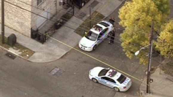 Police surround an apartment believed to be linked to the arrest of terror suspect Quazi Mohammad Rezwanul Ahsan Nafis