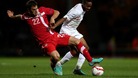England's Raheem Sterling battles for the ball with Serbia's Filip Malbasic in the first leg last week