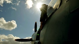 Pilot looks out the cockpit of a Spitfire