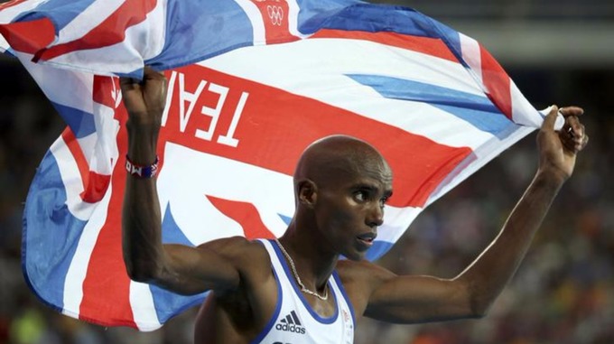 Mo Farah completes a lap of honour.