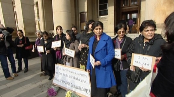 Women stand in Vigil for Malala