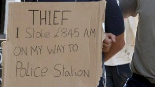 The sign Mr Cremer hung around his ex-employee's neck