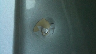 Pellet damage to car