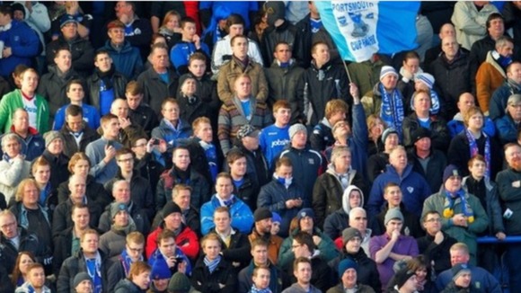 Fans supporting Portsmouth at Fratton Park