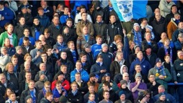 Fans supporting Portsmouth at Fratton Park