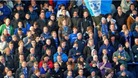 Fans supporting Portsmouth at Fratton Park
