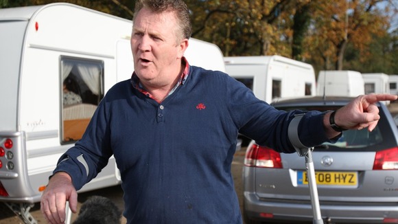 Patrick Egan speaks to the media at outside Dale Farm illegal travellers site after the completion of the council clearance operation.