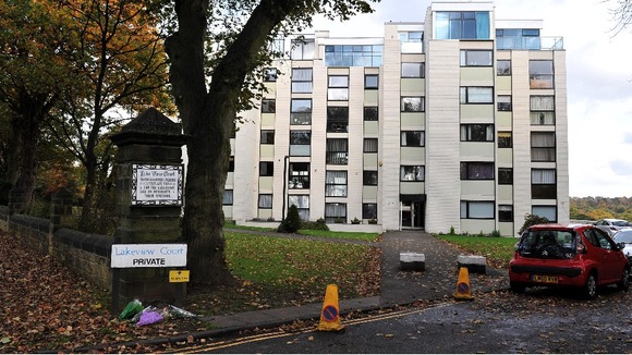 Flowers were laid outside the block of flats after Jimmy Savile's death