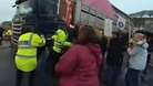 Lorry and protesters