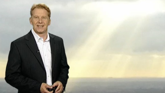 Simon Parkin in front of weather photo