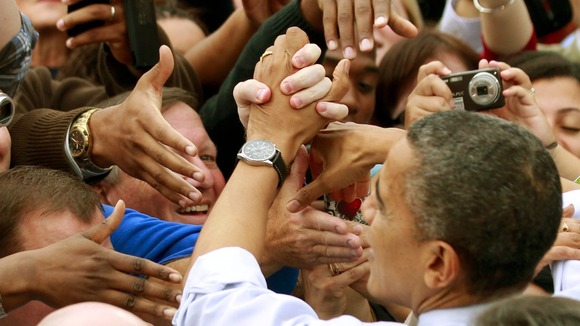 President Barack Obama greets supporters at a rally in Fairfax, Virginia