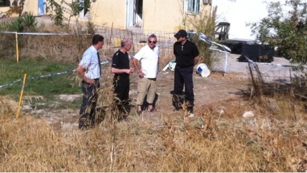 Ben's grandfather Eddie with police at the scene of the toddler's disappearance in Kos.