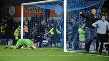 Sheffield Wednesday goalkeeper Chris Kirkland lays on the ground after been struck by a Leeds United fan 