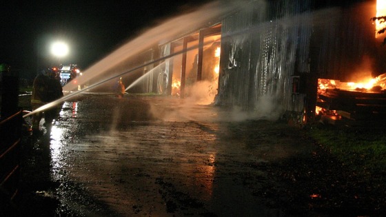 Water jets are used to put out the flames