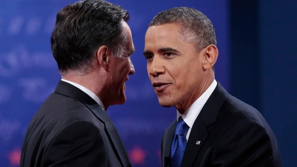 Republican presidential candidate Mitt Romney and US President Barack Obama at the conclusion of the debate