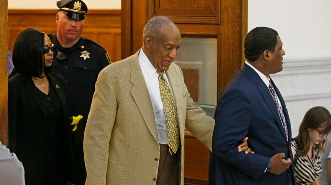 Cosby was helped into court by an aide. 