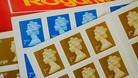 A general view of first and second-class stamps at a Post Office in Overseal, Derbyshire