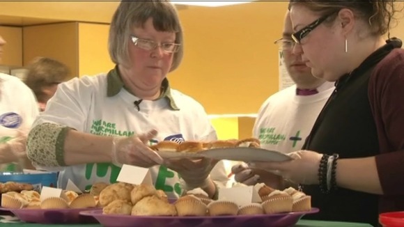 Julie organises charity cake sales to raise money for cancer research