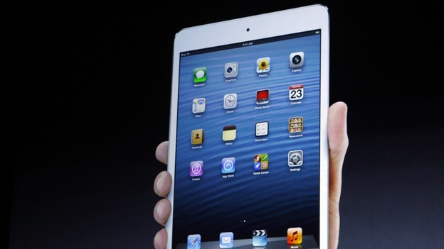 The new iPad mini is projected on a screen