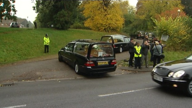 The funeral cortege arrives