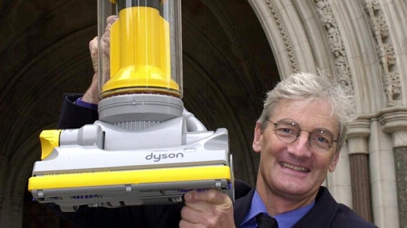 James Dyson pictured with his pioneering 'bagless' hoover in 2000.