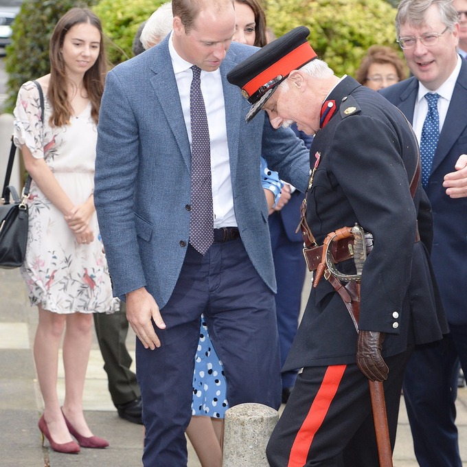 The Queen's representative appeared uninjured after the tumble.