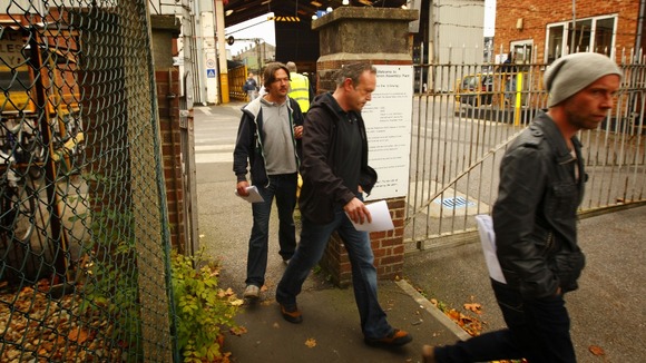Workers leave the Ford Transit Assembly Plant in Southampton after being told that the site will close.
