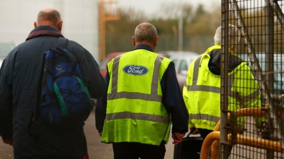 Workers leave the Ford Transit Assembly Plant in Southampton after being told that the site will close.