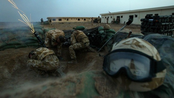 A mortar team from 40 Commando fires phosphorus mortar