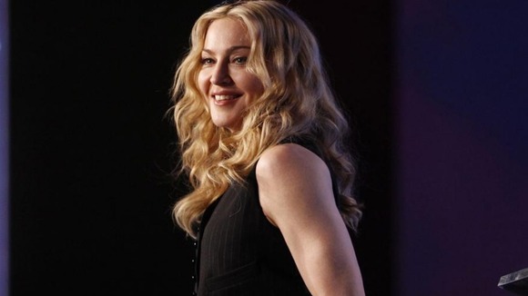 Recording artist Madonna takes part in a news conference ahead of her Super Bowl performance