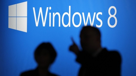 People arrive at the launch event for Microsoft Windows 8 operating system in New York