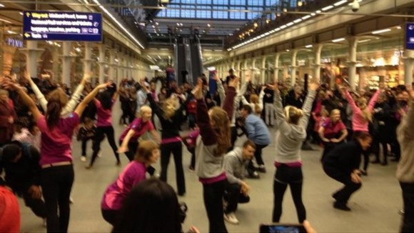 Team London Ambassadors dance at St Pancras station.