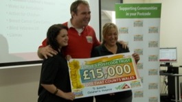 Scott Quinnell with employees from Ty Bobaith