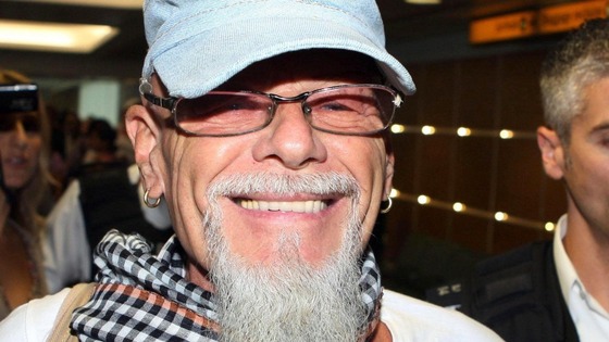 Gary Glitter pictured arriving at Heathrow Airport in 2008