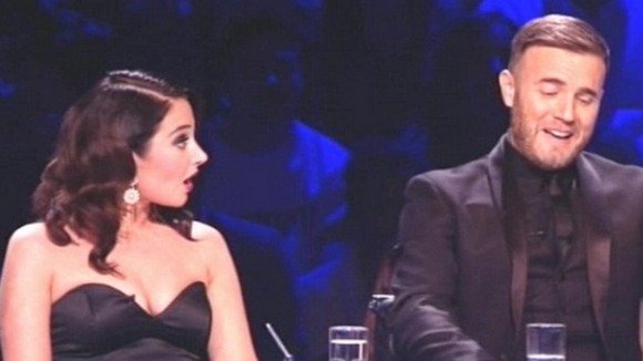 Gary Barlow and Tulisa Contostavlos with the Talent Show award for the The X Factor, backstage at the National Television Awards 2012.