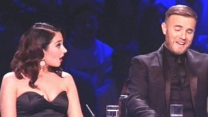 Gary Barlow and Tulisa Contostavlos with the Talent Show award for the The X Factor, backstage at the National Television Awards 2012.