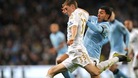 Swansea City's Ben Davies and Manchester City's Carlos Tevez