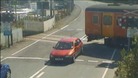 train nearly hits car