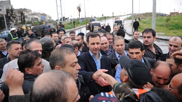 President Assad visits Homs, Syria.