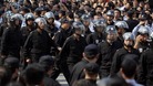 Riot police marched in Ningbo.