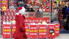 Christmas Shopper and shop filled with Christmas wrapping paper