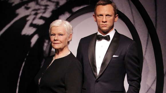Wax works of Daniel Craig and Judi Dench