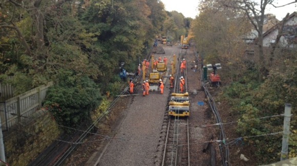 Workers carry out maintenance work on the closed Tyne and Wear Metro